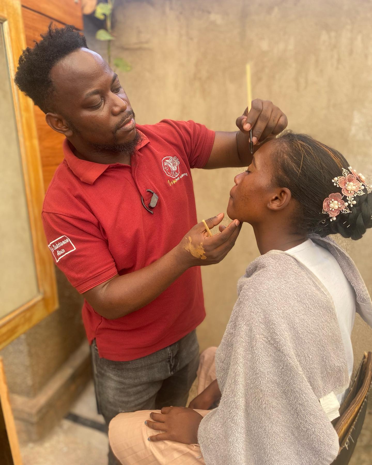 Student work at Zziwa Hair Academy