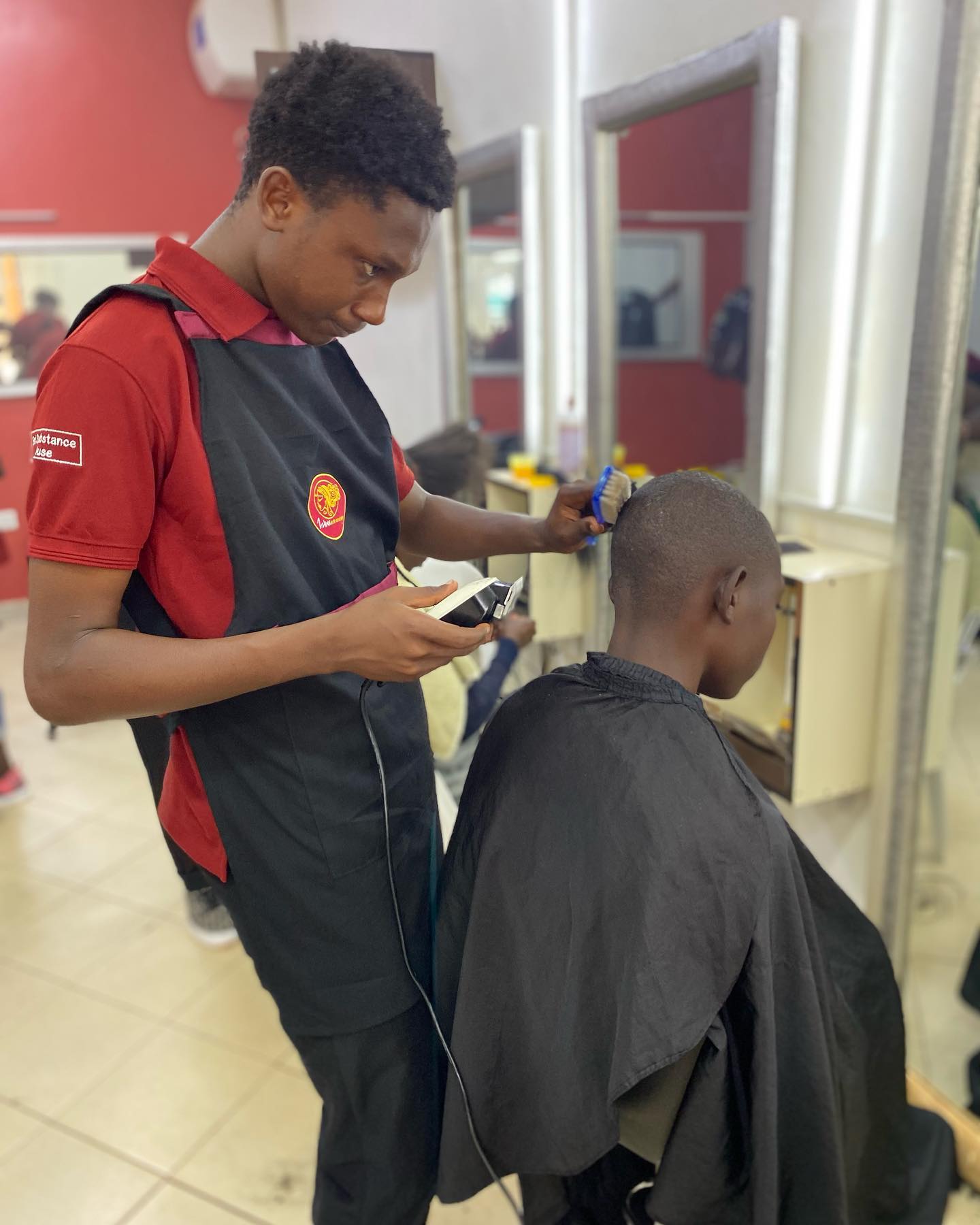 Student work at Zziwa Hair Academy