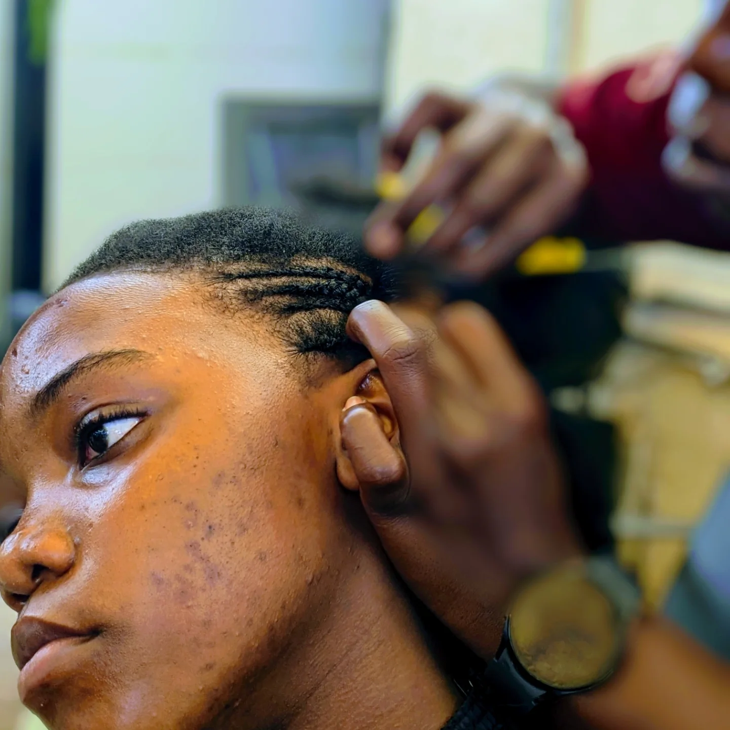Student work at Zziwa Hair Academy