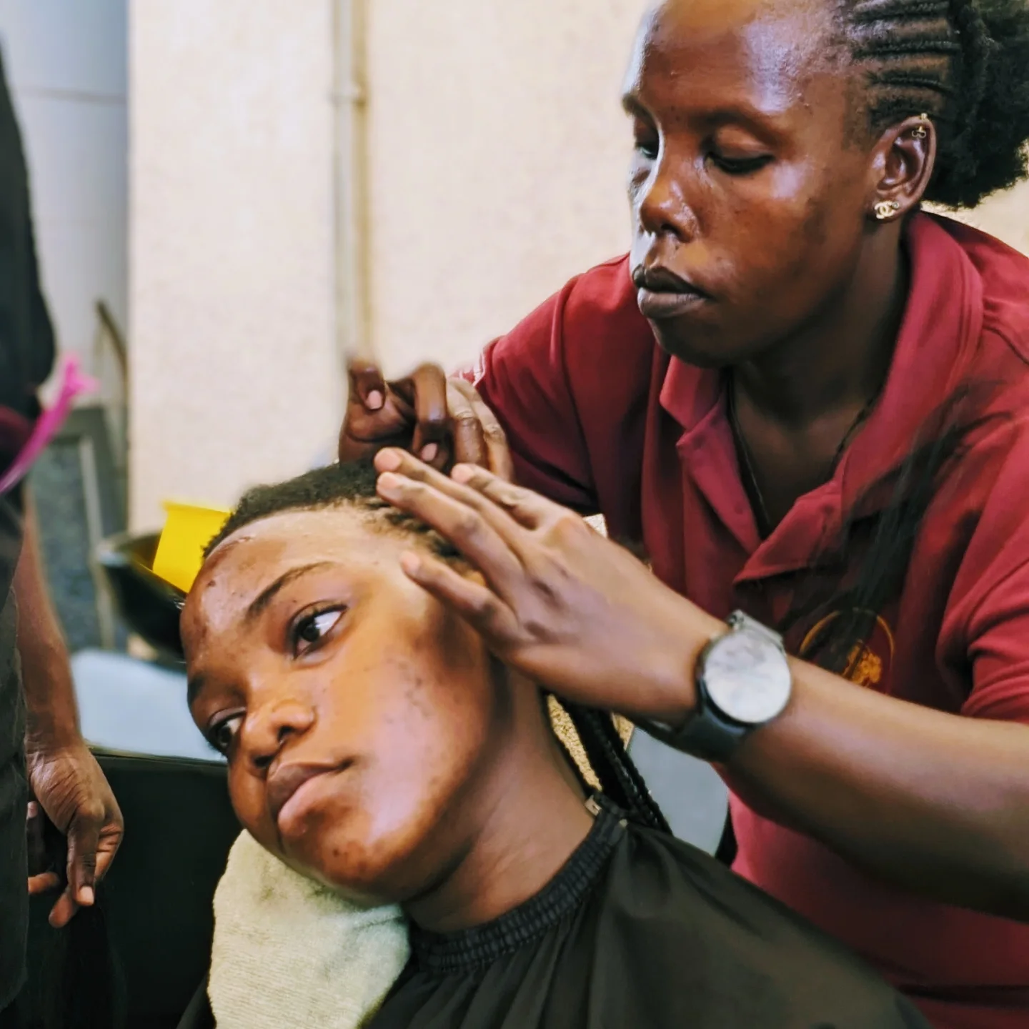 Student work at Zziwa Hair Academy