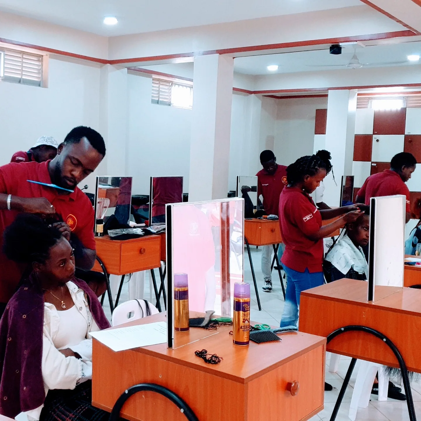 Student work at Zziwa Hair Academy
