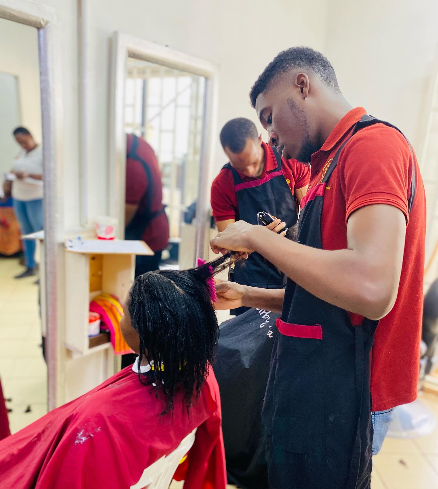 Student work at Zziwa Hair Academy