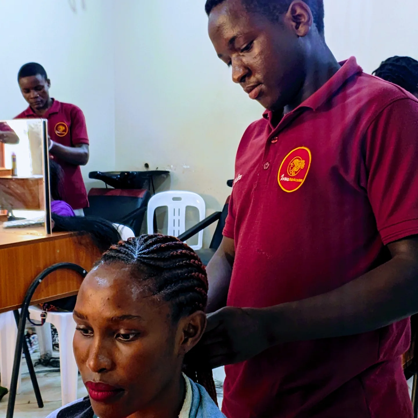 Student work at Zziwa Hair Academy