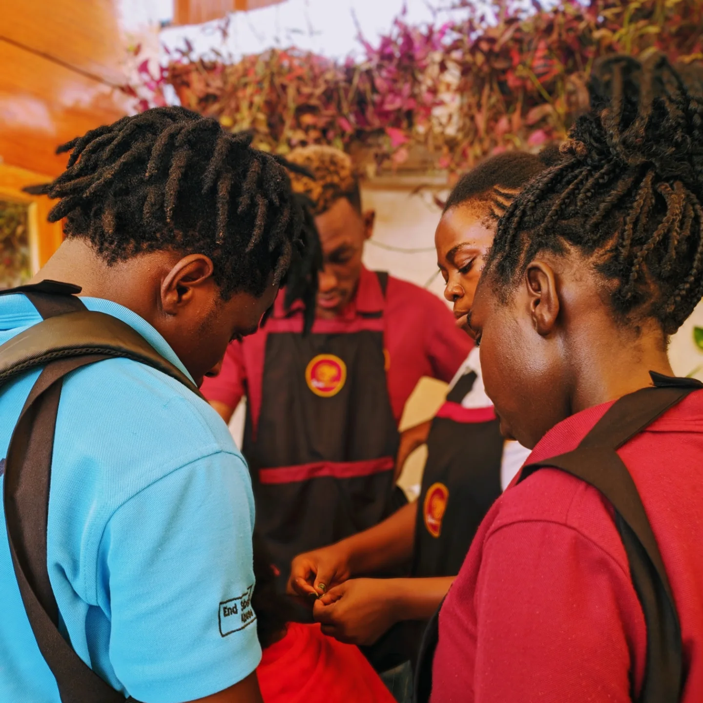Student work at Zziwa Hair Academy