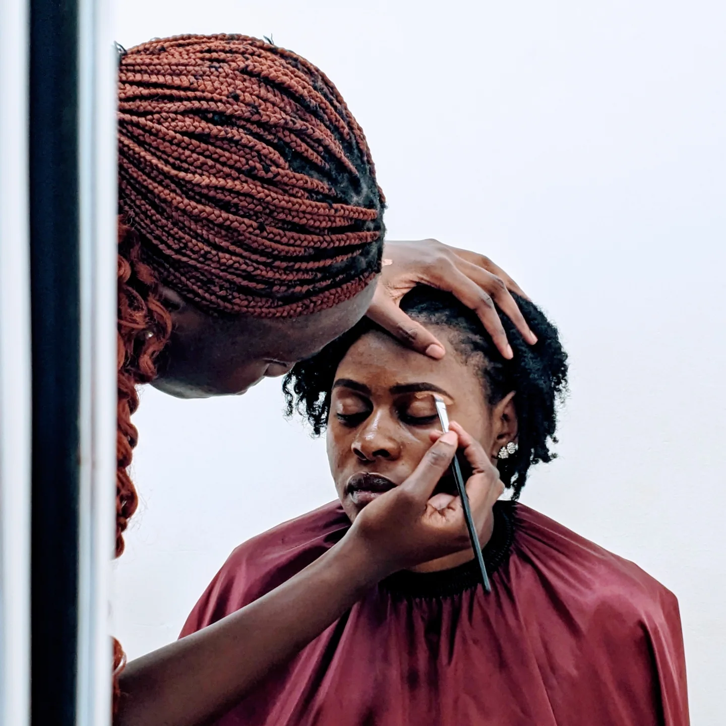 Student work at Zziwa Hair Academy