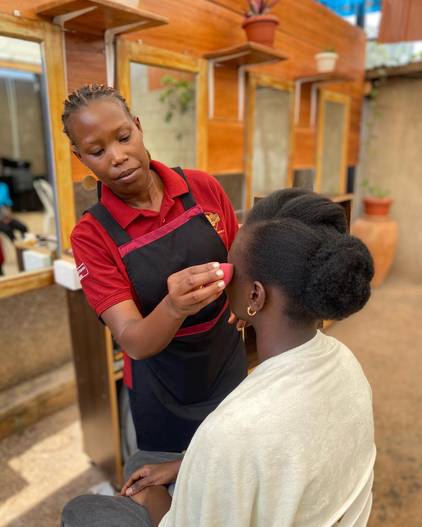 Student work at Zziwa Hair Academy