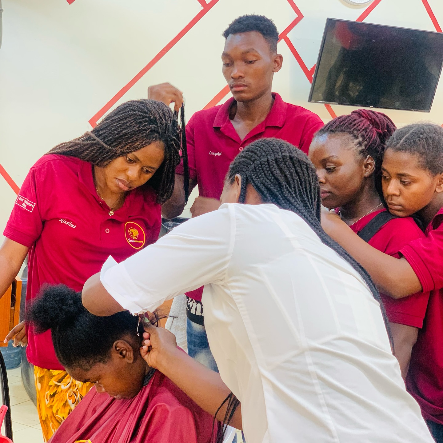 Student work at Zziwa Hair Academy
